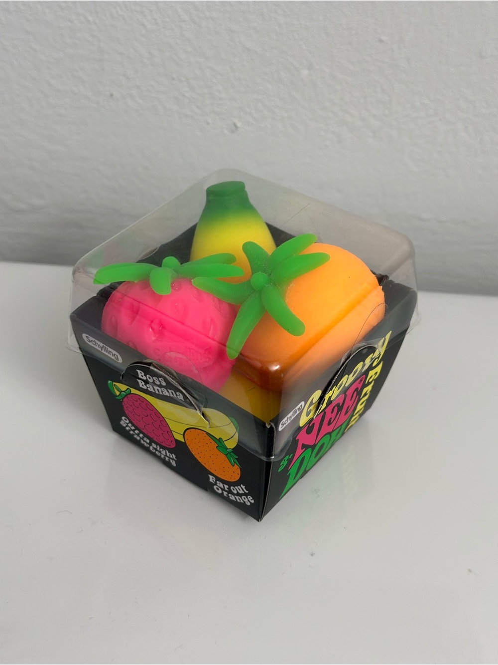 NEE DOH Groovy Fruit Stress Toy - Neon Pink, Green, Orange Packaging